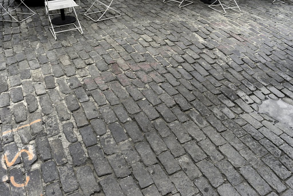 Chairs on Cobbled Street